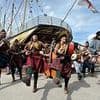 Sea shanty band caught in slavery probe as six members are arrested while group's leader 'goes on the run' after minibus crash