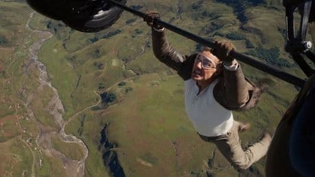 Tom Cruise director says stunt ‘separated the joints’ in actor’s fingers as he clung to biplane