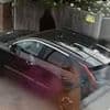Woman captures moment brazen 'thief' tries to break into car while filming TikTok video