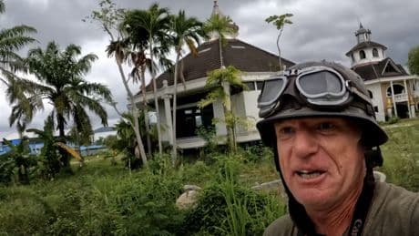 Man exploring abandonded zoo left astonished when he flings object into pond