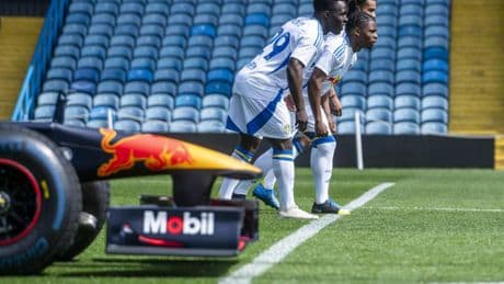Premier League side risk ruining pitch as stars race RED BULL F1 CAR in their stadium