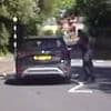 Instant karma! Moment raging motorist speeds past learner with crazy overtake - only to drive straight into the hands of armed police