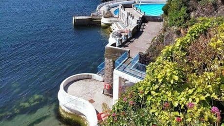 Britain's iconic art deco lido re-opens with beach and bar after £4.5million revamp