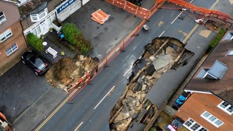Huge 65ft sinkhole that forced families to evacuate ‘could take months to fix’ due to ‘network of hidden tunnels’