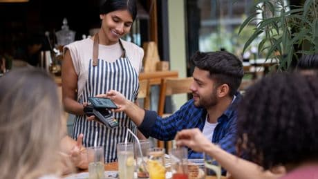 My friend got rich and wants to pay for everything. I feel awkward – what do I do?
