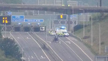 Man dies on M90 as police probe unexplained death