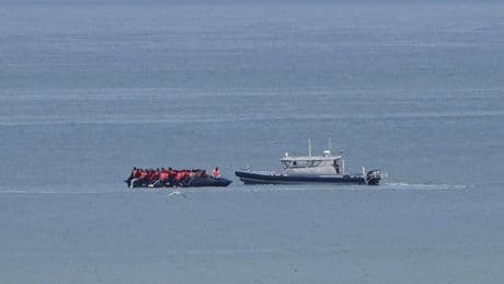 1 person dies when a boat overloaded with migrants sinks in the English Channel