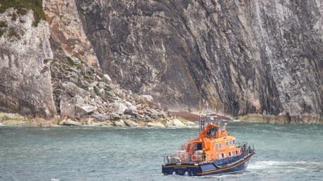Two people dead after car leaves the road and plunges off cliff at world-famous coastal landmark