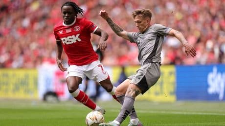 League One play-off final descends into chaos with fans fuming at EIGHT-MINUTE stoppage