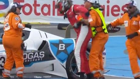 Le Mans driver leaps out of car and punches and kicks rival's motor in extraordinary scenes
