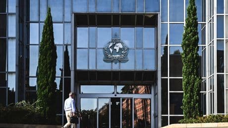 Former Interpol Official Detained for Role in ‘Big Carousel’ of Corruption