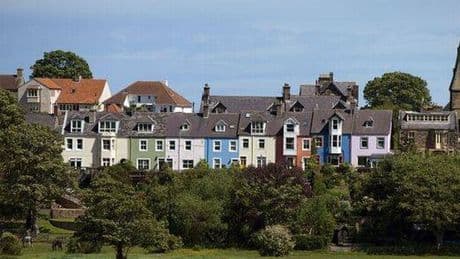 'Perfectly tranquil' village with stunning beach just minutes from famous neighbour