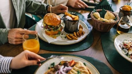 4 things you should never order in front of your boss or coworkers, according to an etiquette expert