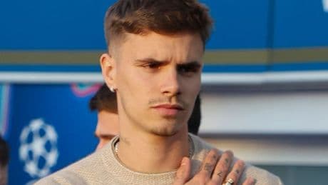 Romeo Beckham looks crushed in first outing after Kim Turnbull split