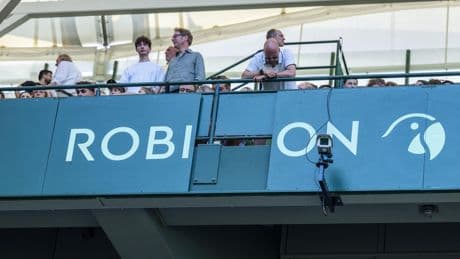 Zverev steps in after an advertising board lands on a spectator at Halle