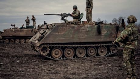 Russia put out an unusual propaganda video of a 'captured' US-made armored vehicle flying American and Russian flags in Ukraine
