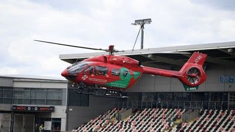 EFL clash delayed as ground evacuated after air ambulance lands on pitch for ill fan