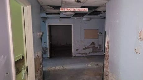 UK hospital's eerily abandoned rooms left to rot but patients still allowed in