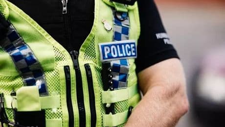 Woman, 86, arrested after police find human remains buried at house