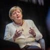 Tien jaar na ‘wir schaffen das’ is Merkel blij met vooruitgang in integratie migranten