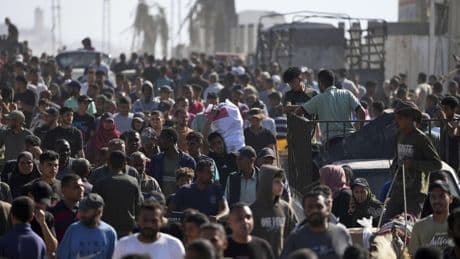 Israeli gunfire heard as crowds of Palestinians try to reach an aid center in Gaza