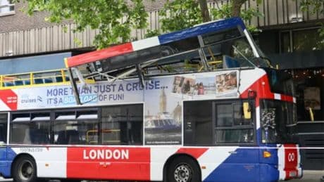 Open-top London tourist bus crashes into tree