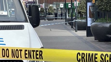 Man charged with murder after stabbing inside bank