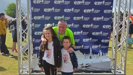 Ella-Rose waiting at the finish line to greet West Lothian man running half-marathon to support her