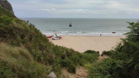Man, 50, dies at UK beauty spot after getting into trouble swimming in water