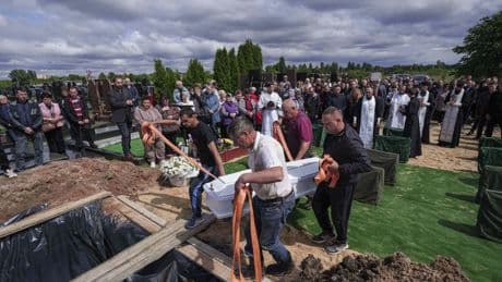 Funeral of 3 siblings killed in Russian strike underscores mounting toll on Ukrainian families