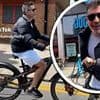 Simon Cowell flashes a huge smile despite getting 'lost' during sun-soaked outing on his £8K e-bike - five years after breaking his back in horror cycle crash