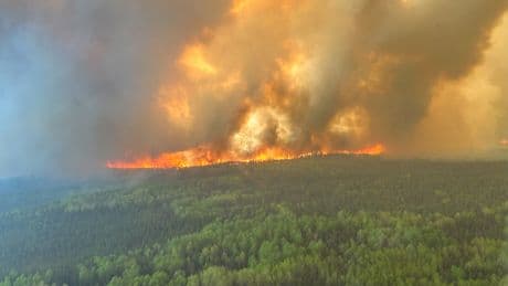 As wildfires rage, an updated outlook shows the worst may be yet to come