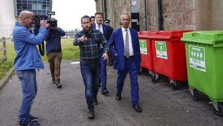 'Coward': Nigel Farage dodges reporters as he skips Hamilton walkabout