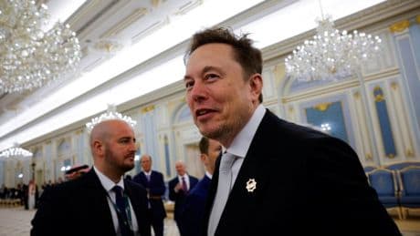 Donald Trump forcefully pulls in Elon Musk for handshake during Saudi Arabia visit