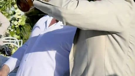 Gary Lineker reunites with brother Wayne amid 17-year feud as pair neck bottle of booze at his son’s Ibiza wedding