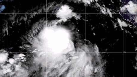 Tropical Storms Juliette and Fernand churn over open waters in 2 oceans