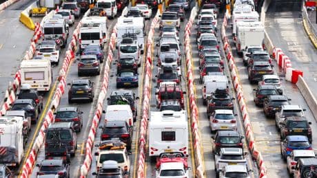 Brits stuck in huge queues as summer holiday getaway begins & drivers warned of ‘midweek mayhem’ as 14m take to roads