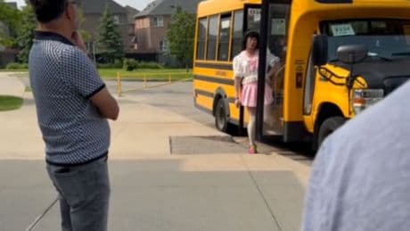 Ontario school bus driver who wore schoolgirl's uniform and had 'Lolita's Line' sign removed from job