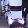 Moment suspects carjack a tanker lorry during police pursuit in LA