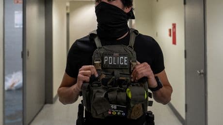 Should ICE Agents Be Allowed to Wear Masks? It Depends Whom You Ask.
