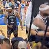 Moment ex-NBA superstar swings punches and brawls with fans after being ejected in shocking scenes