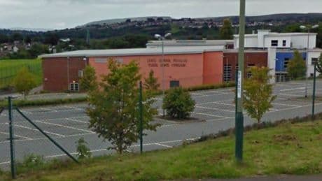School locked down by armed police amid weapon fears