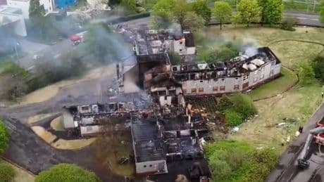 Teenager arrested after blaze at derelict homeless shelter in Glasgow