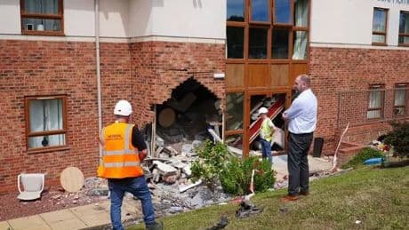 Two pensioners dead as BMW ploughs into care home during police chase