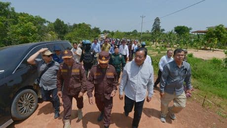 Thailand returns 2 wounded soldiers to Cambodia but continues to hold 18 of their comrades