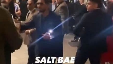 Moment Salt Bae is ushered away from venue as he responds to claims he was kicked out of PSG’s Champions League party