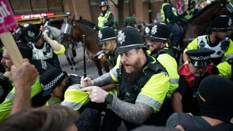 Police clash with protesters at migrant hotel rallies across the country