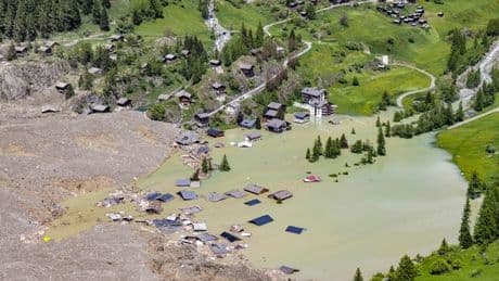 Swiss glacier collapse threatens two more villages as dam could burst