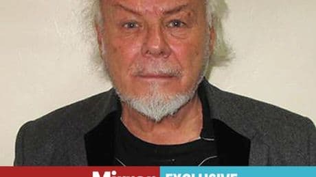 Winking Gary Glitter's 'chilling' boasts about trip abroad to UK hospital carers