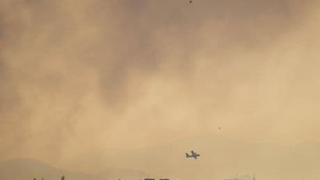 Giant cloud of smoke seen over Madrid as wildfires rage in central Spain
